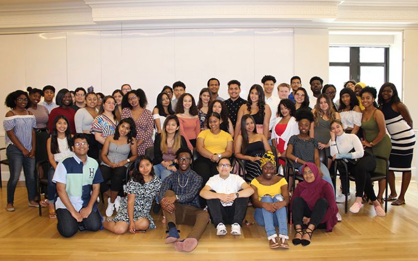Large group of new EOP/HEOP students gathered in open room at the end of the 2019 Pre Freshman Summer Program