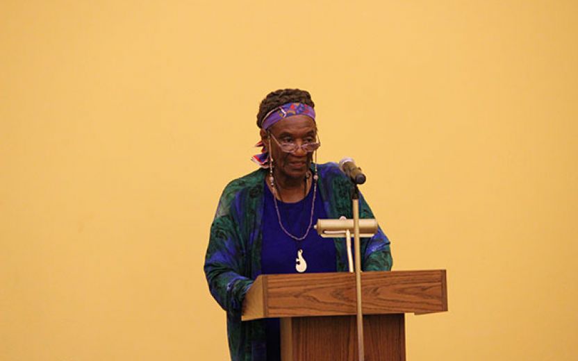 Gloria Joseph, Cornell University’s first director of COSEP speaking from a podium at the Africana Center Multipurpose Room on Cornell University’s campus at the 50th anniversary of COSEP celebration 