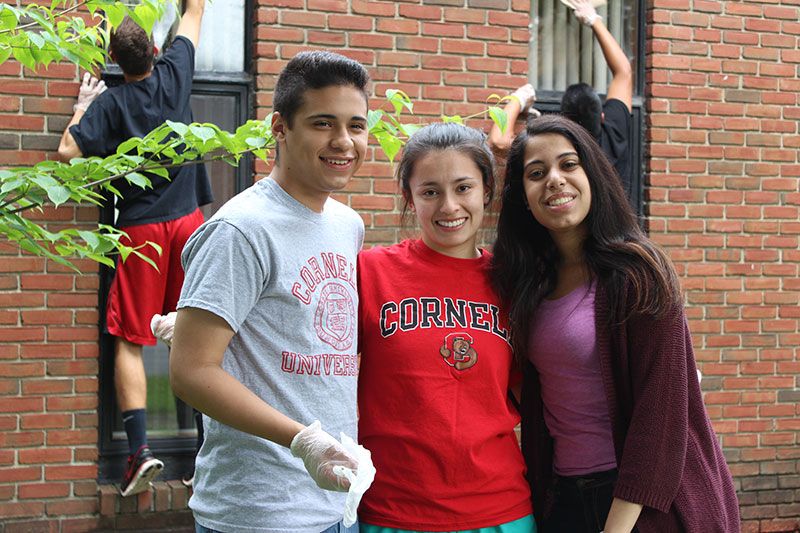 Three EOP/HEOP students outside at a community service event during the 2014 Pre Freshmen Summer Program