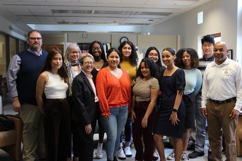 Students in the OADI office in a group posing with Speaker of the New York Assembly Carl Heastie, Assembly Member Barbara Lifton, and Senator Debra Glick