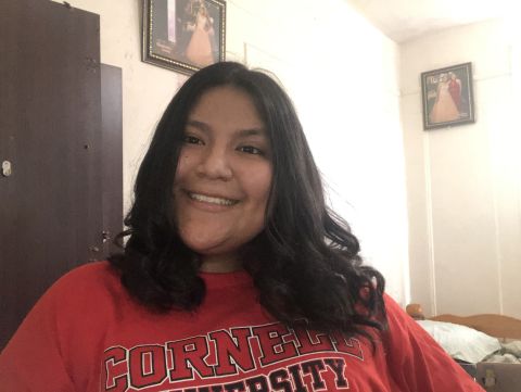 Photo of Chelsea in a red Cornell shirt