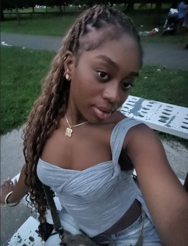 Rose-Lynn is smiling at the camera