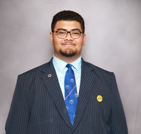 Letiunasema Nuusila is smiling at camera and wearing professional clothes